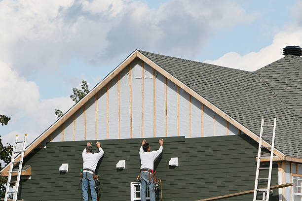 Professional Siding technician working in Nashville, NC